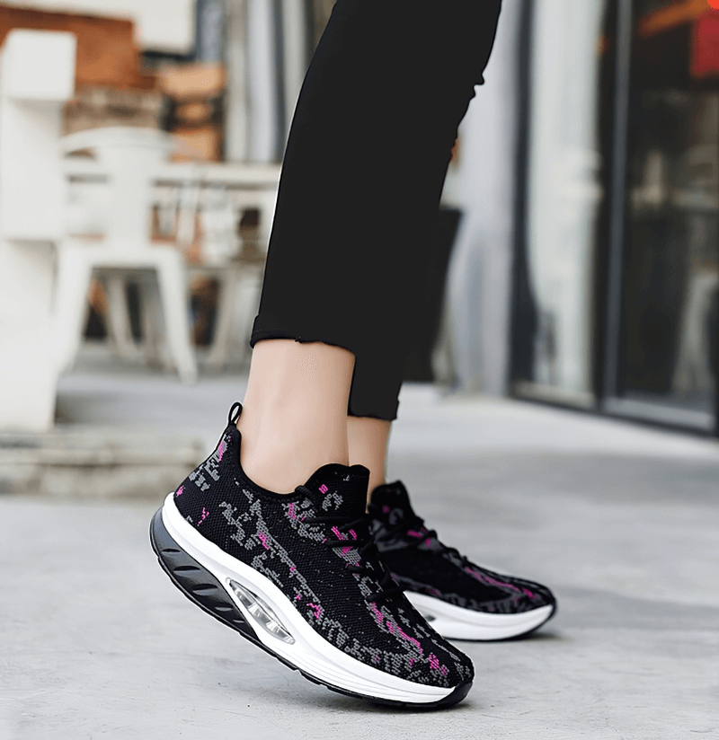 Woman wearing Fitness Lace-up Platform Sneakers, SF0253, with breathable mesh and cushioned EVA insole, perfect for lifestyle performance.