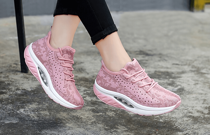 Pink lace-up platform sports sneakers for women with breathable mesh and cushioned EVA insole. Perfect for active lifestyle.