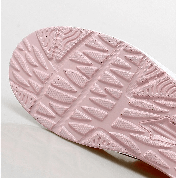 Close-up of the pink outsole of Fitness Women's Lace-up Platform Sports Sneakers, showing traction pattern for stability and comfort.