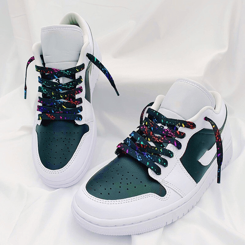 Stylish sports shoes with flat durable colorful shoelaces, perfect for a vibrant unisex look and secure fit during activities.