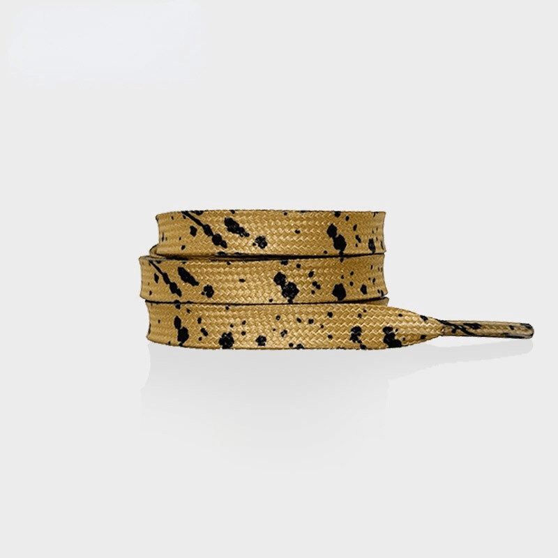Stylish gold and black speckled flat shoelaces for sports shoes, unisex and durable, perfect for adding flair to any footwear.