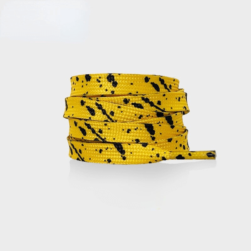Flat durable yellow shoelaces with black speckles for sports shoes, made of polyester for a secure fit and vibrant style - SF1130