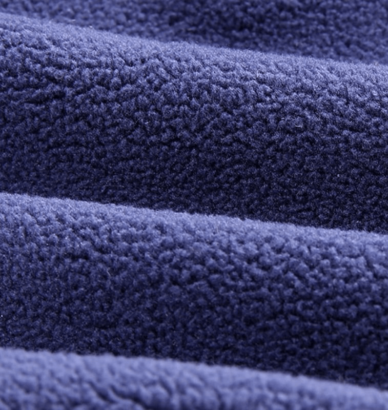 Close-up of soft blue fleece fabric texture used in windproof sports face mask SF0730.