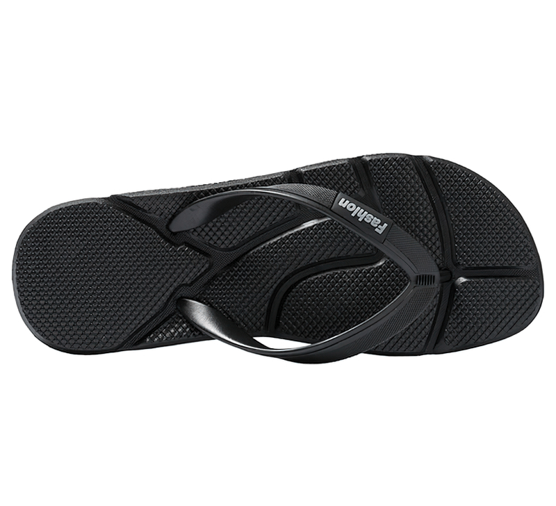 Black flexible lightweight beach flip flop for men with massage sole, made with high-quality PVC and EVA for comfort and support.
