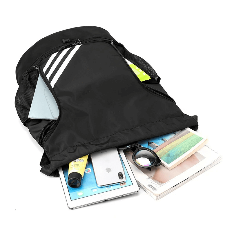 Unisex gym drawstring backpack with ample storage, showcasing waterproof nylon fabric and items inside. Ideal for fitness and basketball.