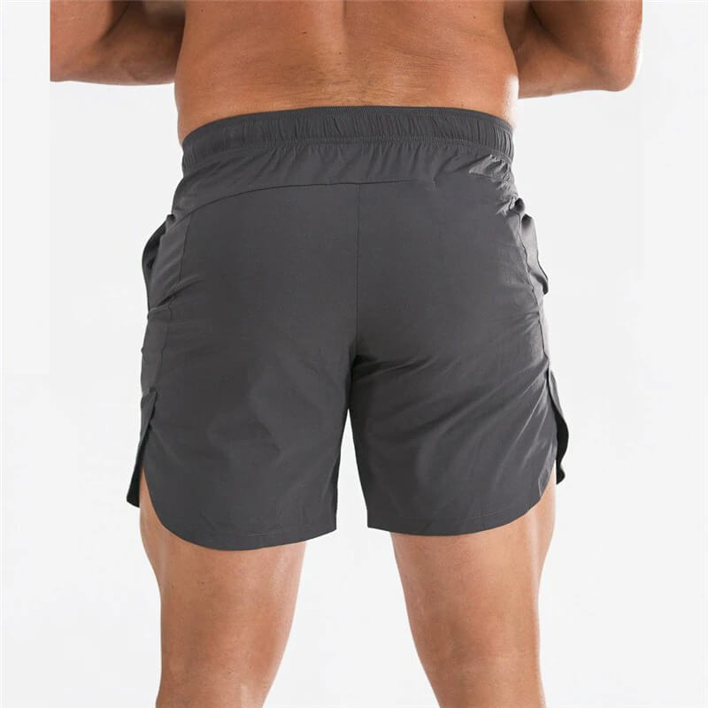 Back view of male quick-dry running shorts in charcoal grey, ideal for gym workouts, featuring breathable and flexible polyester-spandex blend.