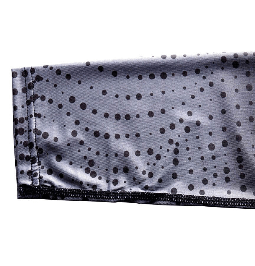 Close-up of High Elastic Compression Leggings fabric with dotted pattern, showcasing durability and elasticity for men's running sportswear, SF0865.