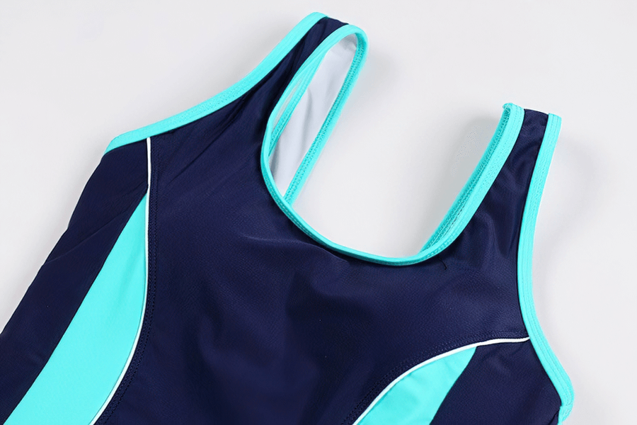 Dark blue and light blue high elastic one-piece swimsuit with patchwork design, perfect for conservative beach bathing and swimming.