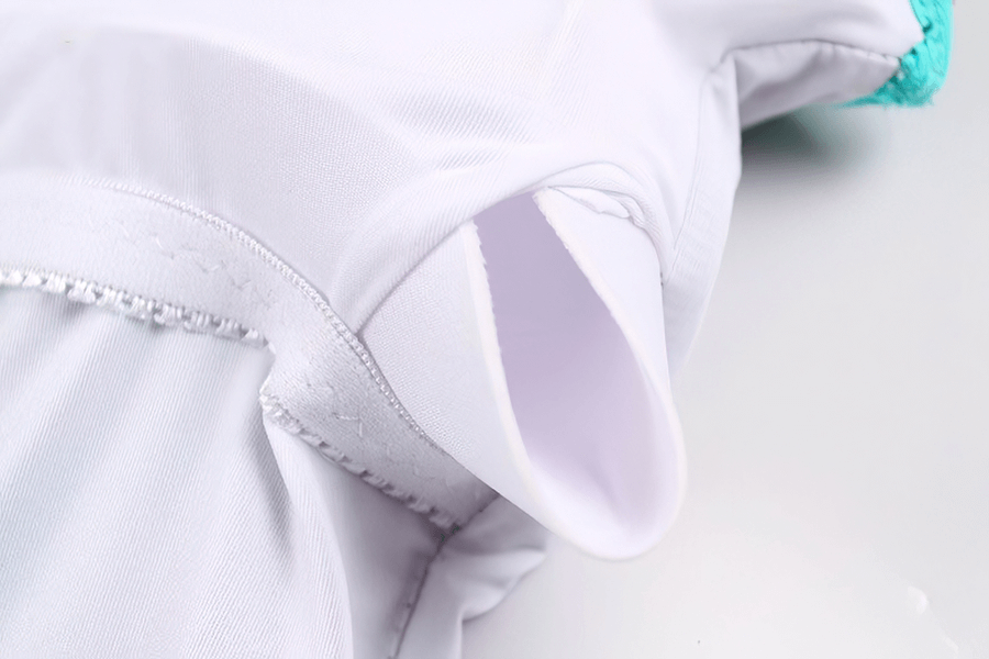 Close-up of white high elastic swimsuit fabric showing detail and texture for durability and flexibility.