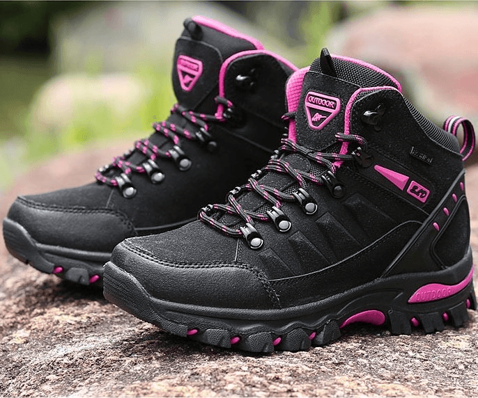 High Tourist Women's Mountaineering Shoes in black and pink, featuring lace-up closure and rubber soles for reliable traction on hikes.