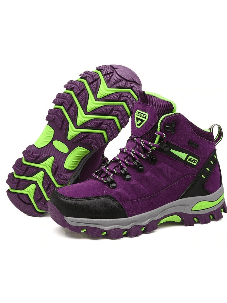 High Tourist Women's Mountaineering Shoes - Durable purple shoes with green accents and robust traction, perfect for adventurous hikes.
