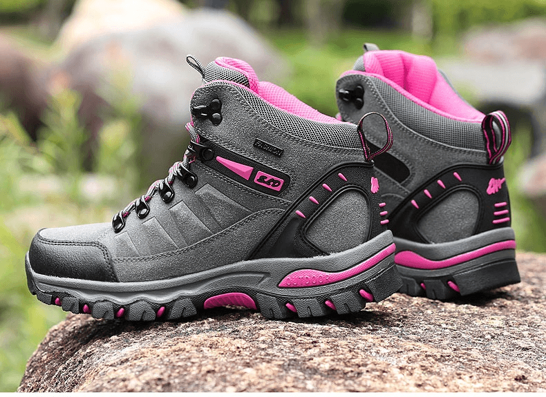 High Tourist Women's Mountaineering Shoes SF0244 in gray and pink, showing breathable fabric and robust traction.