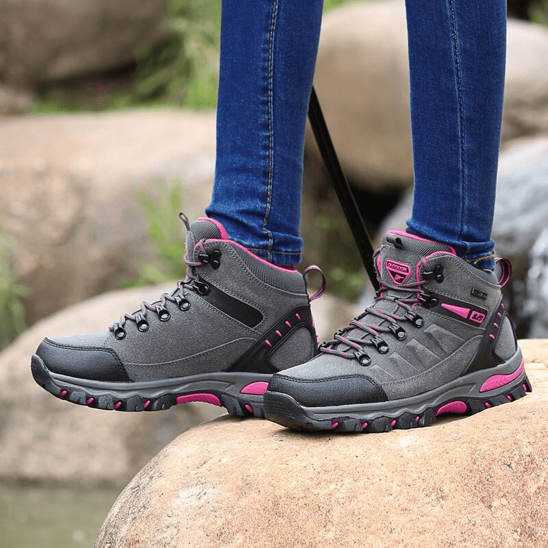 Women's mountaineering shoes by High Tourist SF0244, grey with pink accents, designed for comfort and traction in outdoor hikes.