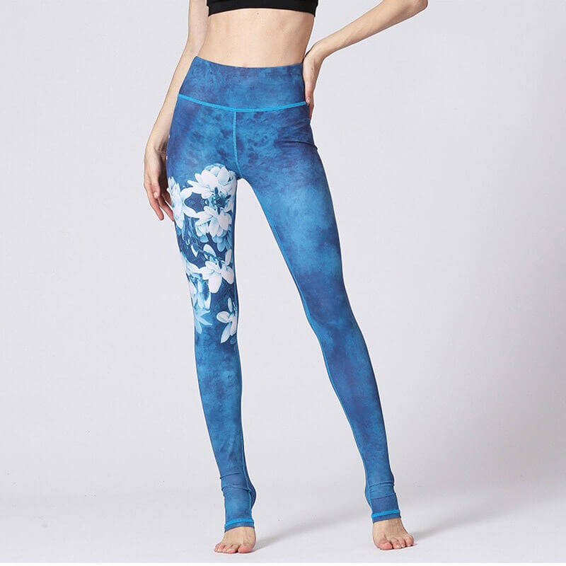 High-waist floral print sports leggings for women in blue, featuring flexible nylon-spandex fabric, perfect for workout comfort.