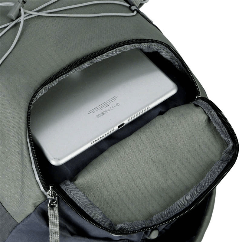 Interior view of hiking backpack showing a spacious compartment with a tablet inside, highlighting large capacity and storage efficiency.