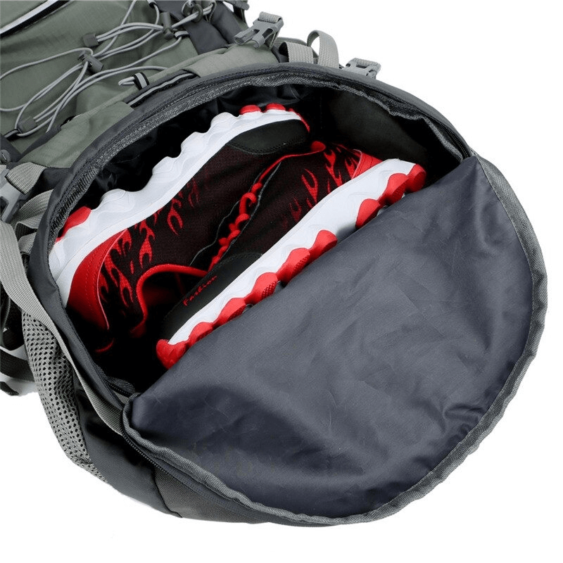 Open view of hiking backpack SF0296 showcasing spacious interior with red shoe compartment, ideal for outdoor adventures.