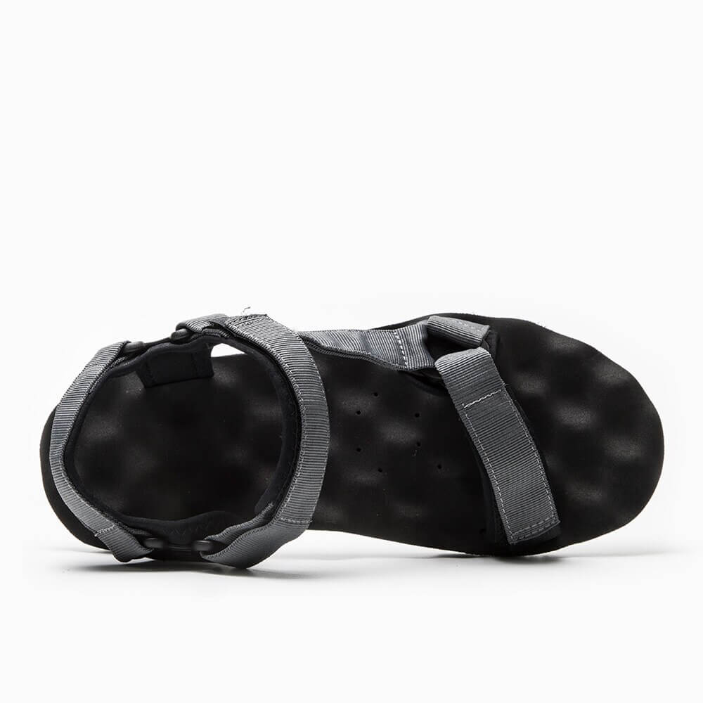 Top view of men's hiking sandal in black with adjustable straps, featuring lightweight canvas and EVA materials for outdoor comfort.