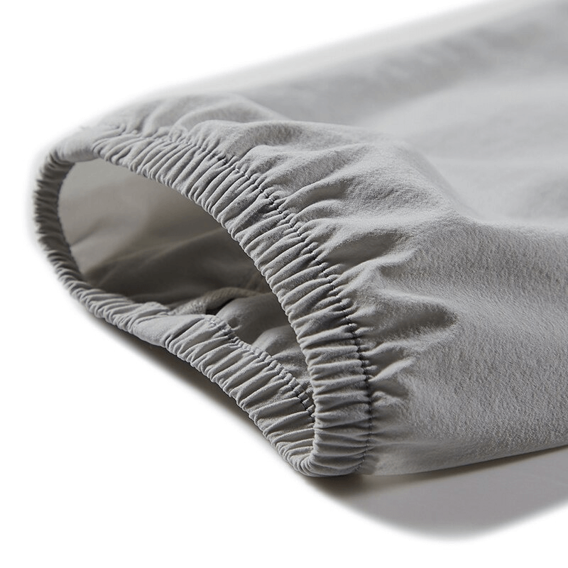 Close-up of elastic cuff on men's windproof hiking jacket, showcasing breathable and water-resistant polyester fabric.