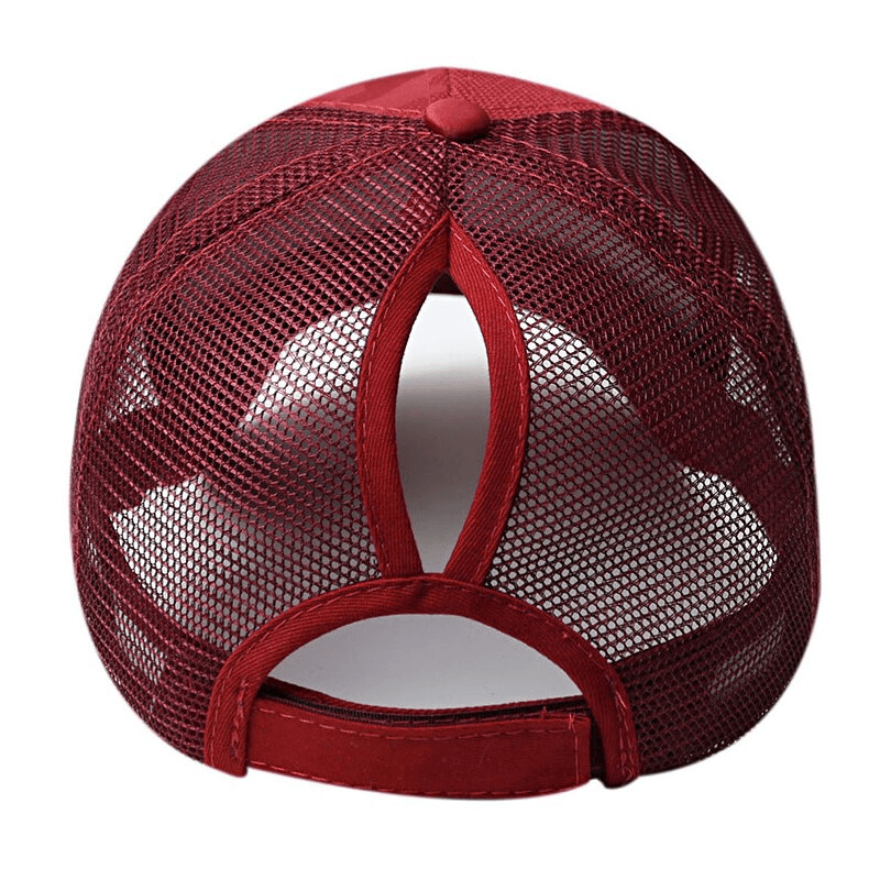 Back view of red hollow-out ponytail baseball cap with mesh design, adjustable snapback, and ponytail opening for outdoor sports.