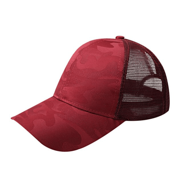 Red hollow out ponytail baseball cap with camo mesh, ideal for outdoor sports. Adjustable snapback and ponytail opening included.