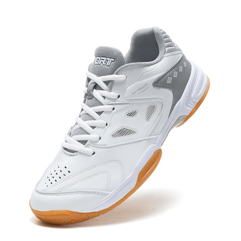 Lace-Up Flexible Tennis Shoe in white with orange sole, featuring breathable microfiber for comfort and superior traction.