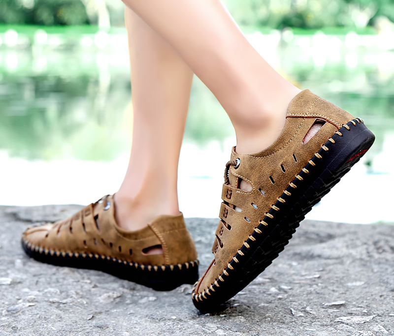 Men's lace-up leather outdoor water shoes with rubber outsole, perfect for hiking and activities by the lake.