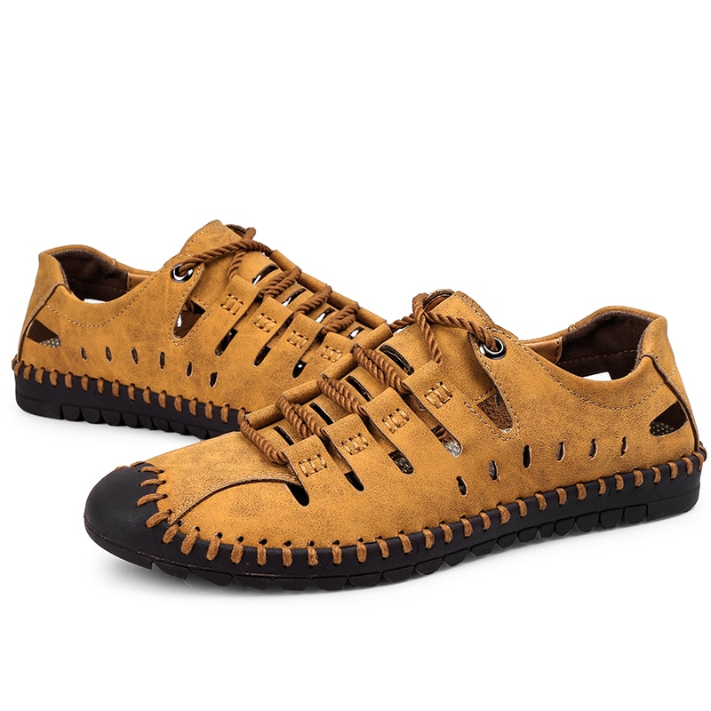 Men's lace-up leather outdoor water shoes with durable rubber outsole, showing stylish design and comfortable fit.
