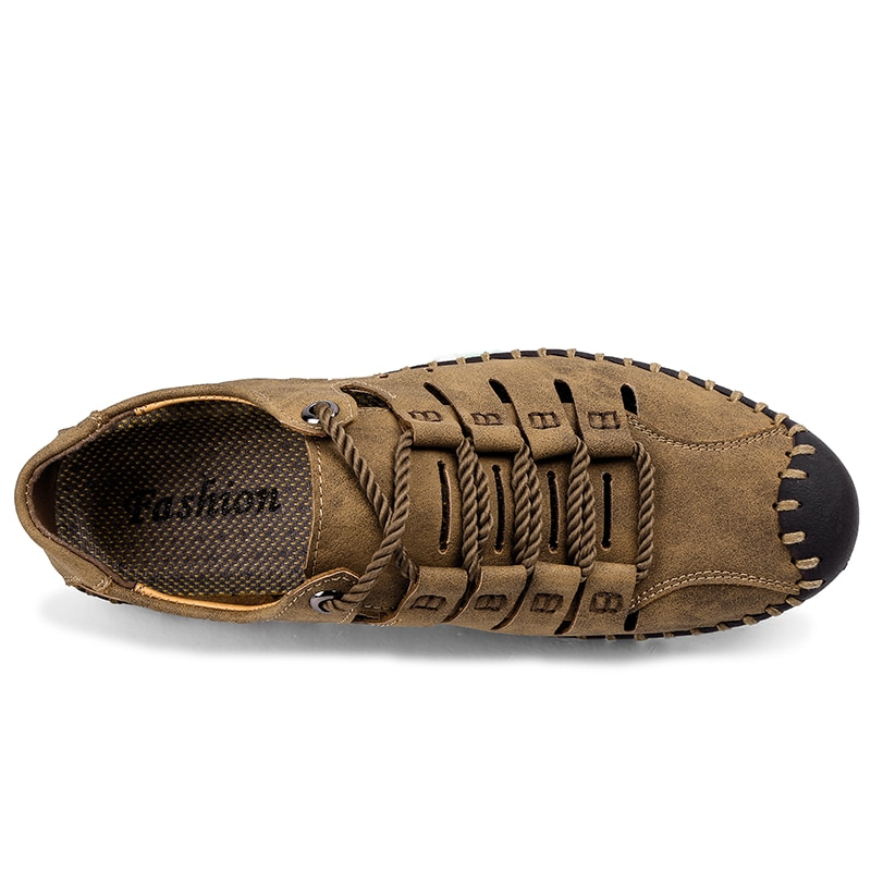 Top view of men's lace-up leather outdoor water sandal with microfiber upper and durable rubber outsole.