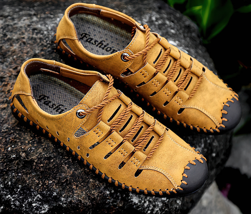 Men's lace-up leather sandals with rubber sole, perfect for outdoor activities and water-friendly adventures.