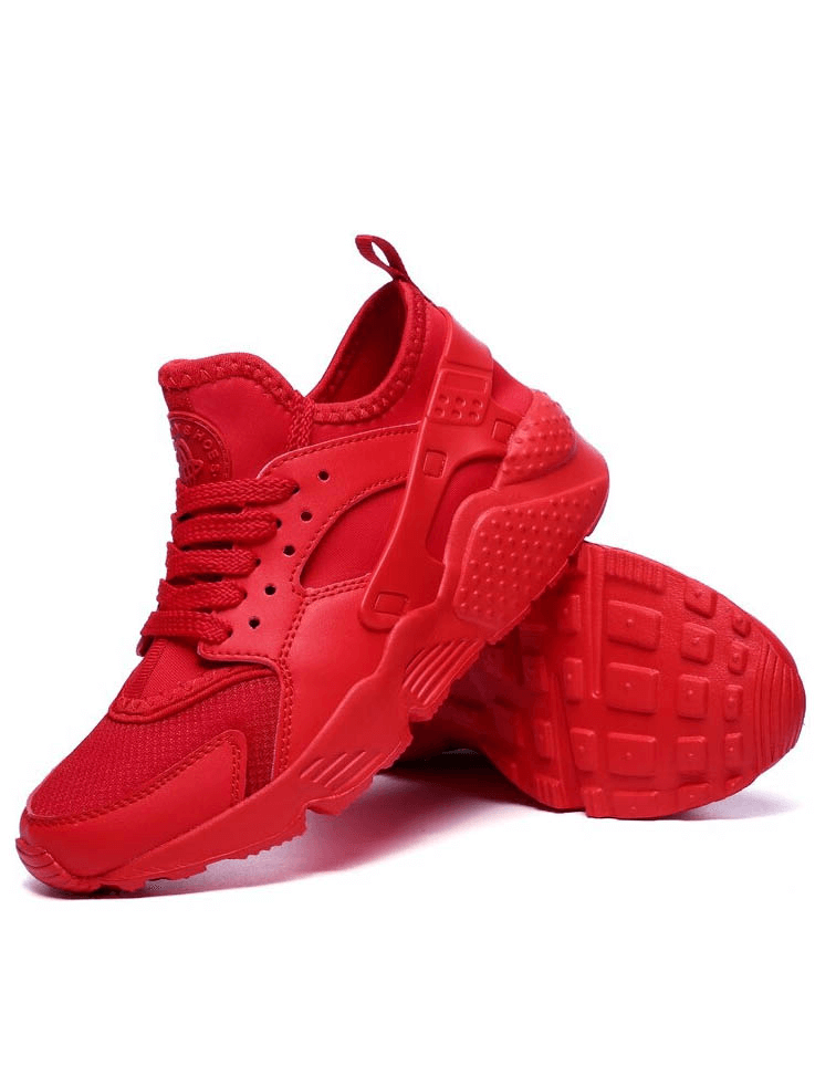 Bright red lace-up mesh elastic running shoes with breathable design, PU leather insoles, and EVA outsole for grip and comfort.
