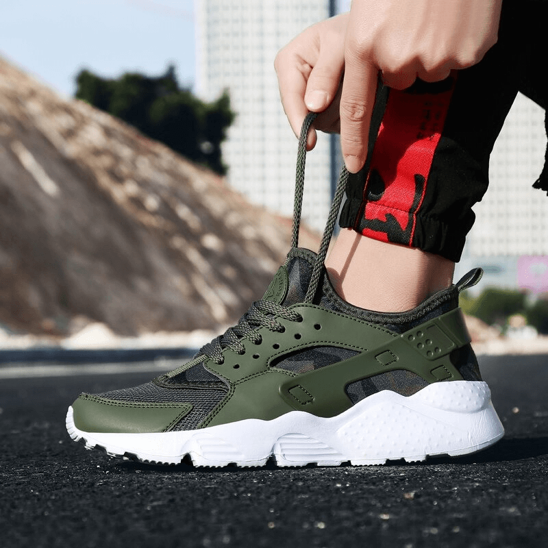 Lace-Up Mesh Elastic Running Shoes in green, ideal for marathoners seeking breathable, lightweight sneakers with height-increasing features.