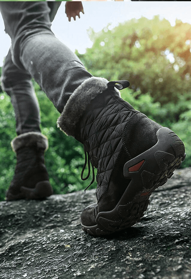 Lace-up waterproof non-slip mid-calf snow boots with fur, perfect for winter adventures, showing tread grip and plush comfort.