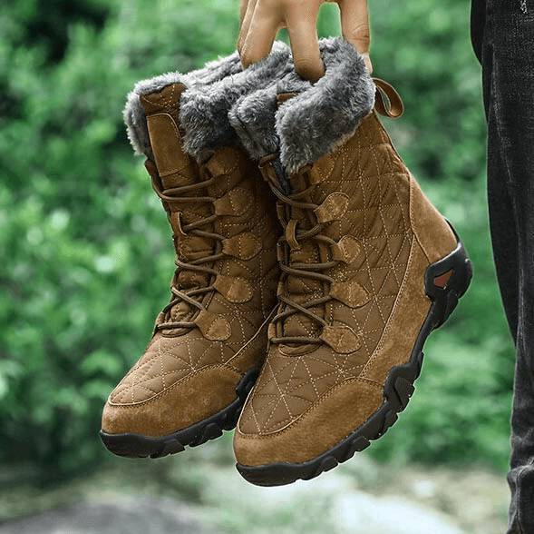 Brown lace-up waterproof mid-calf snow boots with fur lining, perfect for winter warmth and style.