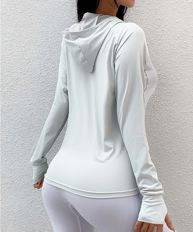 Back view of a women's light grey sports hoodie with thumb holes, showcasing breathable, quick-dry fabric for running and fitness.