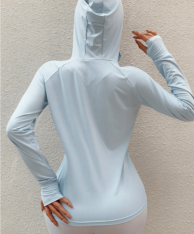 Women's light blue quick-dry hoodie with thumb holes, perfect for running and workouts, shown from the back.