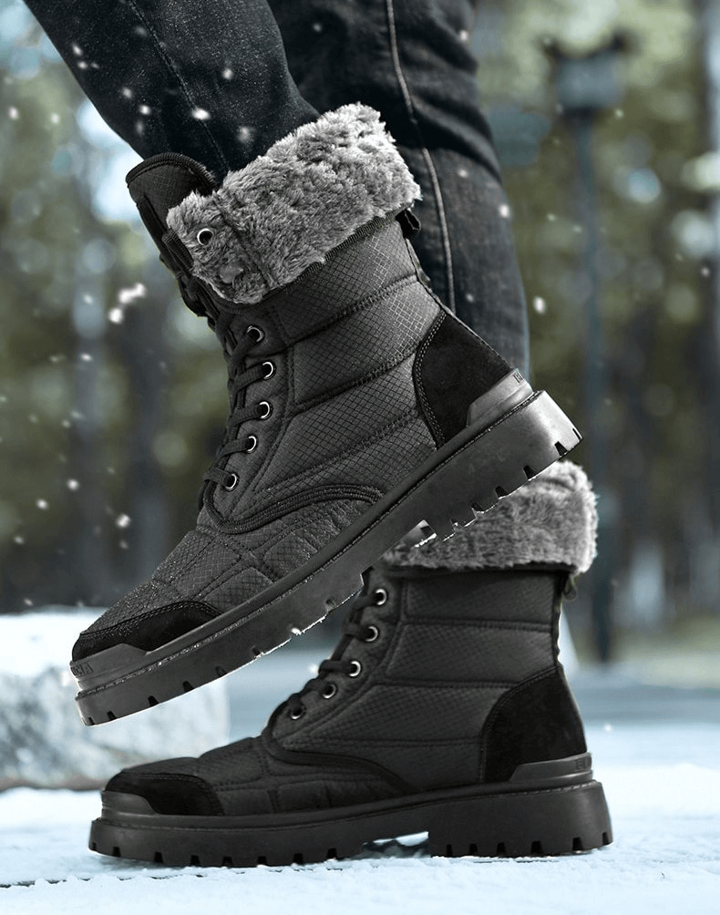 Men's leather waterproof hiking boots with fur in snow, featuring non-slip sole and plush lining for warmth and comfort.