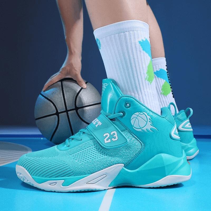 Person wearing teal breathable sneakers with basketball, designed with mesh upper and cushioning, on blue sports court.