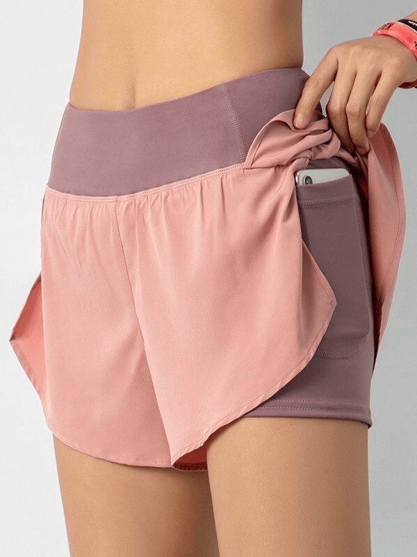 Women's lightweight quick dry sports shorts with elastic waistband and hidden pocket, ideal for active lifestyles.