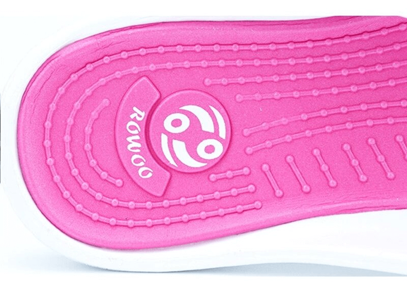 Close-up of pink insole with textured grip and logo on women's lightweight flexible beach slippers by Rowoo, SF0284 model.