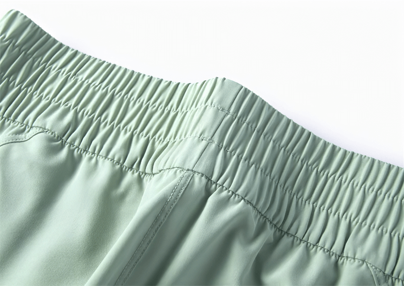 Lightweight high waist fitness sweatpants with elastic waistband and pockets in soft fabric for comfortable workouts.