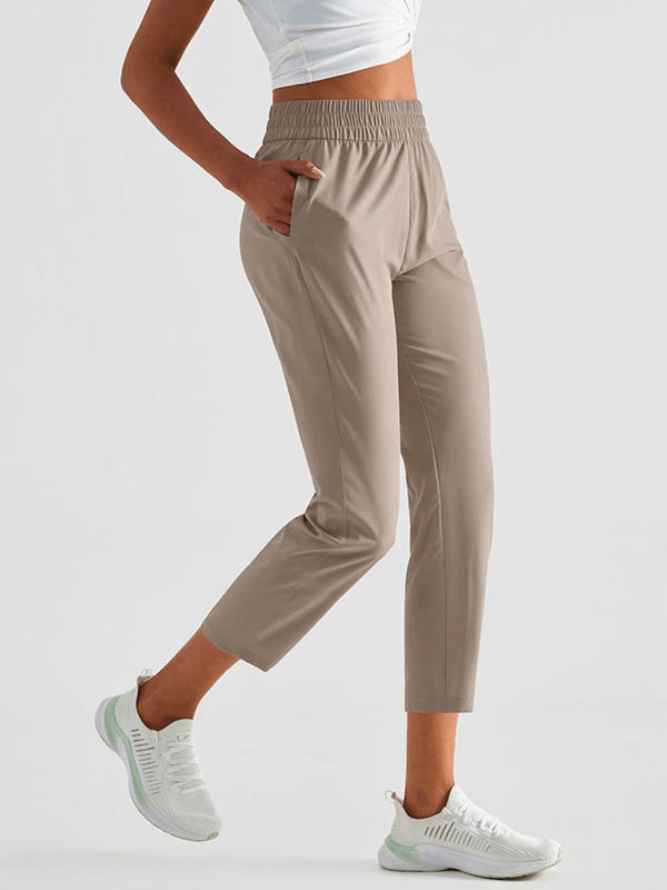 Lightweight high waist fitness workout sweatpants with pockets, showcasing breathable and quick-dry fabric for comfortable exercise.