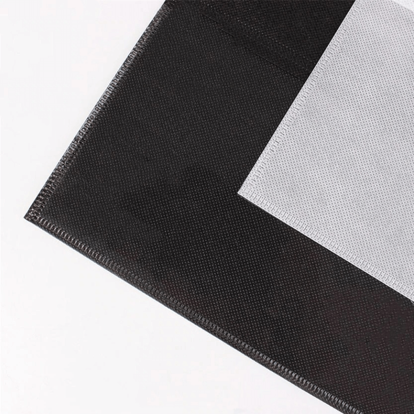 Close-up of black and grey lightweight quick-dry shoe bag covers, made of durable non-woven fabric for sports shoes.