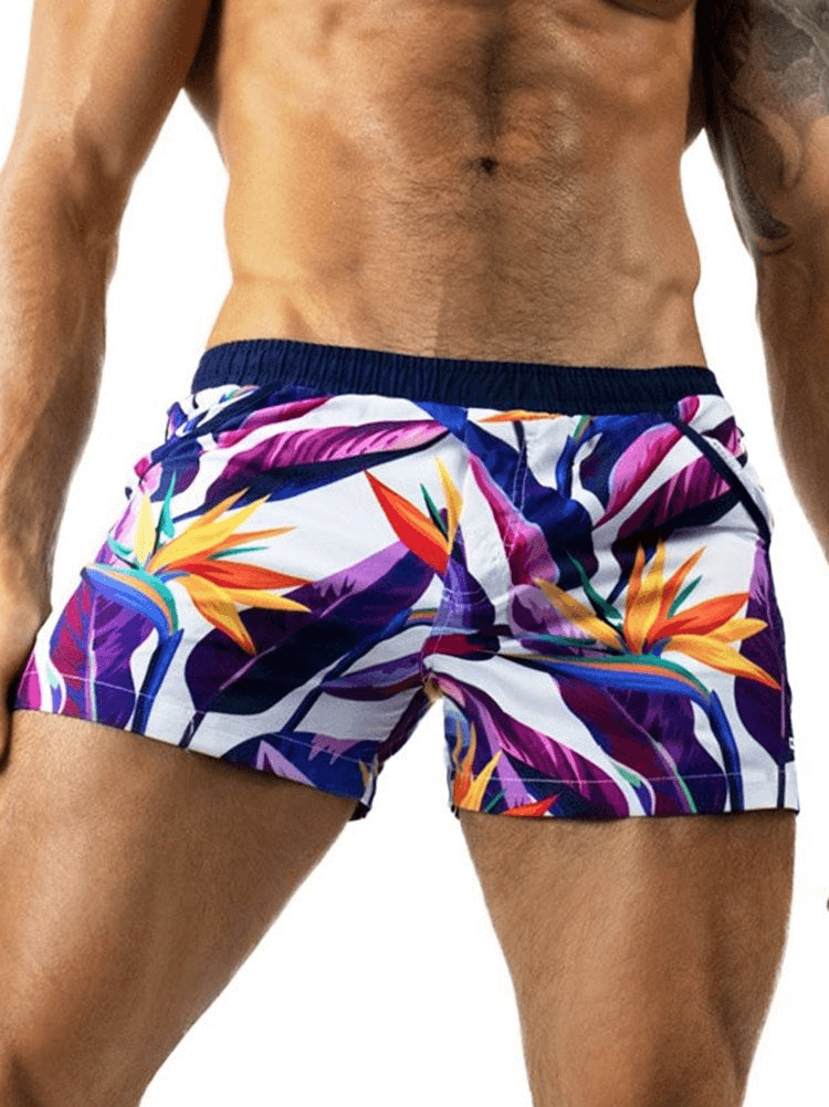 Vibrant floral men's quick-drying sports shorts, lightweight polyester for active lifestyles, ideal for running or fitness activities.