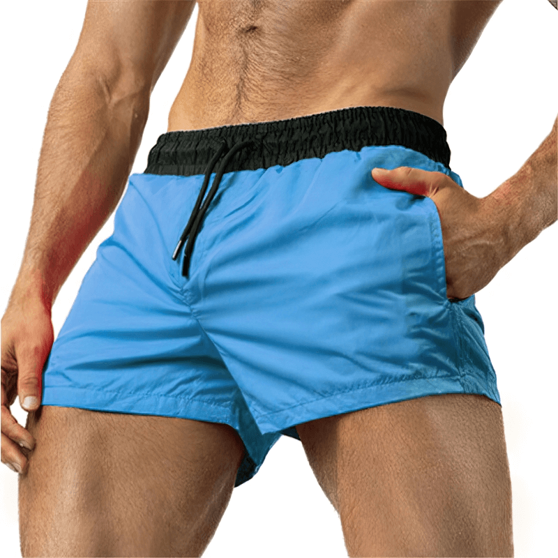 Lightweight quick-drying men's sports fitness shorts in blue, perfect for running and workouts, offering high-performance comfort.