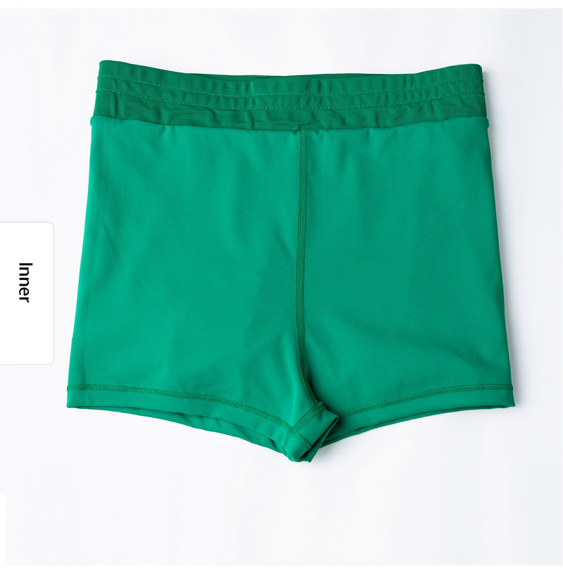 Green lightweight quick-drying women's sports shorts ideal for training, running, yoga, and fitness activities - Model SF1210.