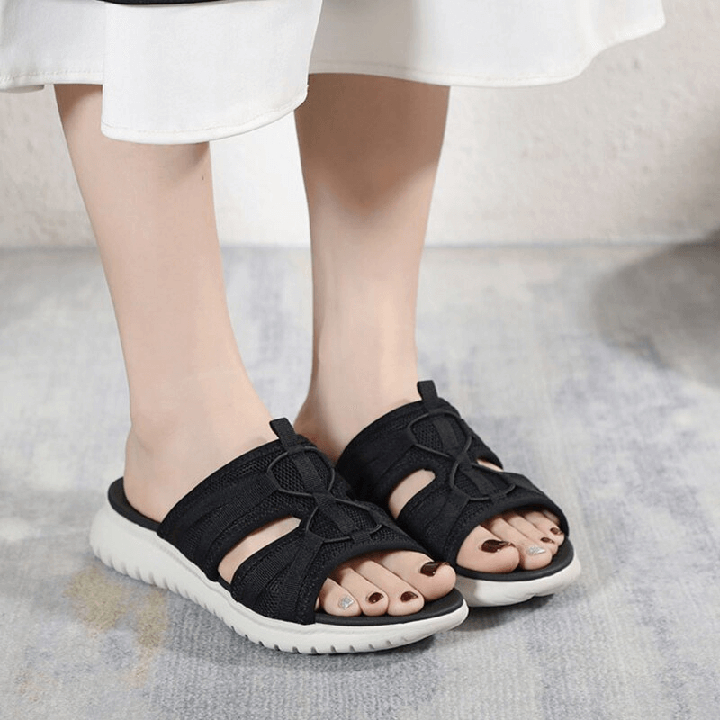 Lightweight waterproof athletic soft flat slippers for women in black, featuring PU leather and TPR sole, ideal for any weather.