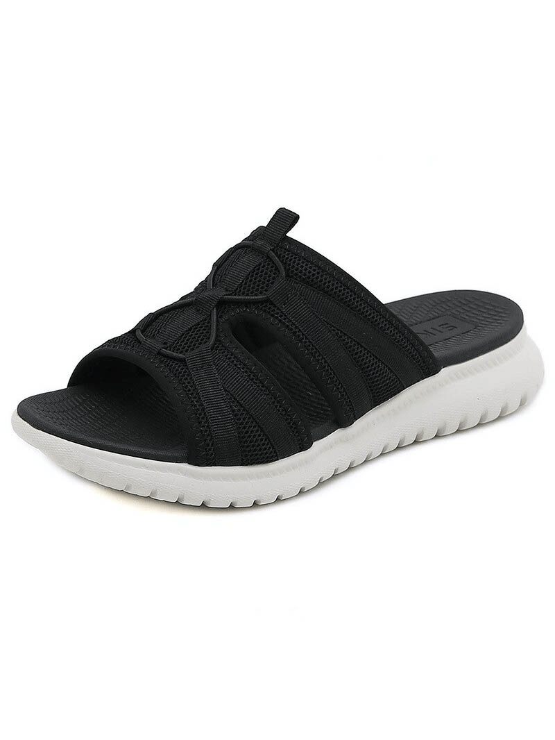 Black lightweight waterproof slippers for women with soft flat design, ideal for active lifestyle and all-weather comfort. Model SF0977.
