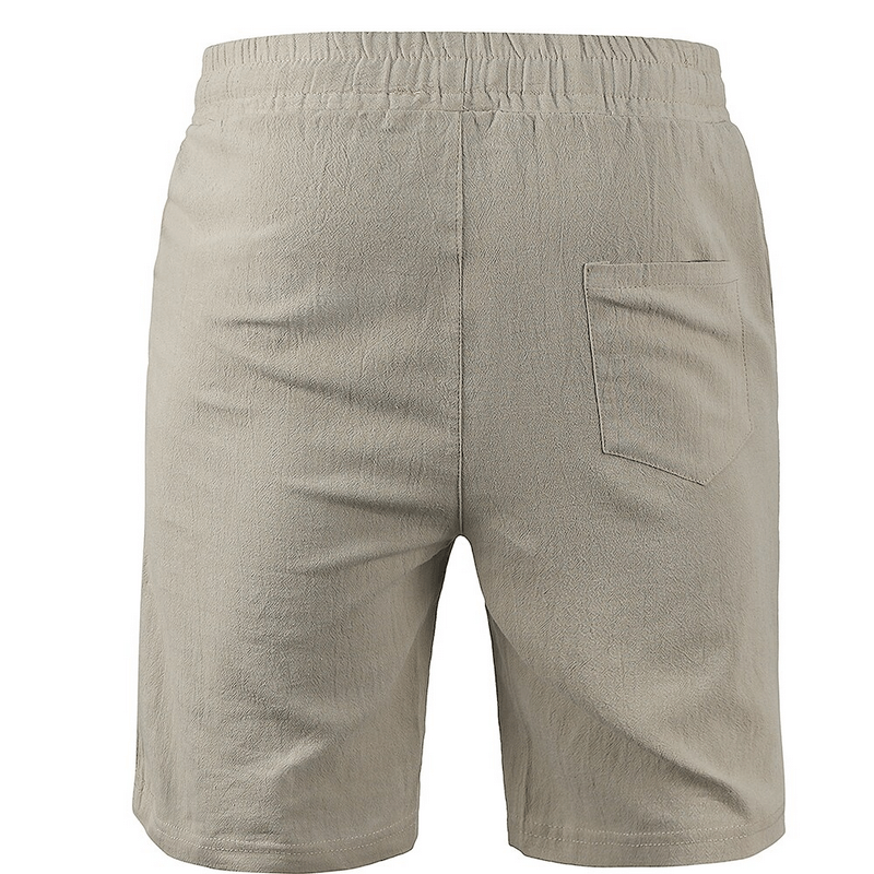 Back view of beige linen solid color breathable men's sports shorts with pocket, mid-rise waistband, and drawstring closure.