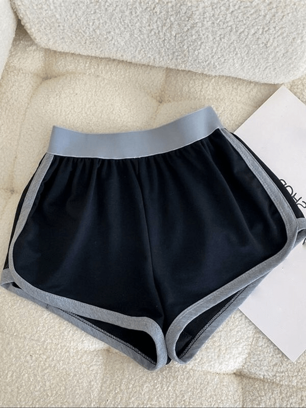 Black and gray loose short women's sports shorts with elastic waistband, decorative appliques, ideal for active wear. SF0167