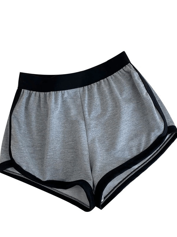 Loose short women's sports shorts in grey with black elastic waistband and decorative appliques, perfect for modern female athletes.